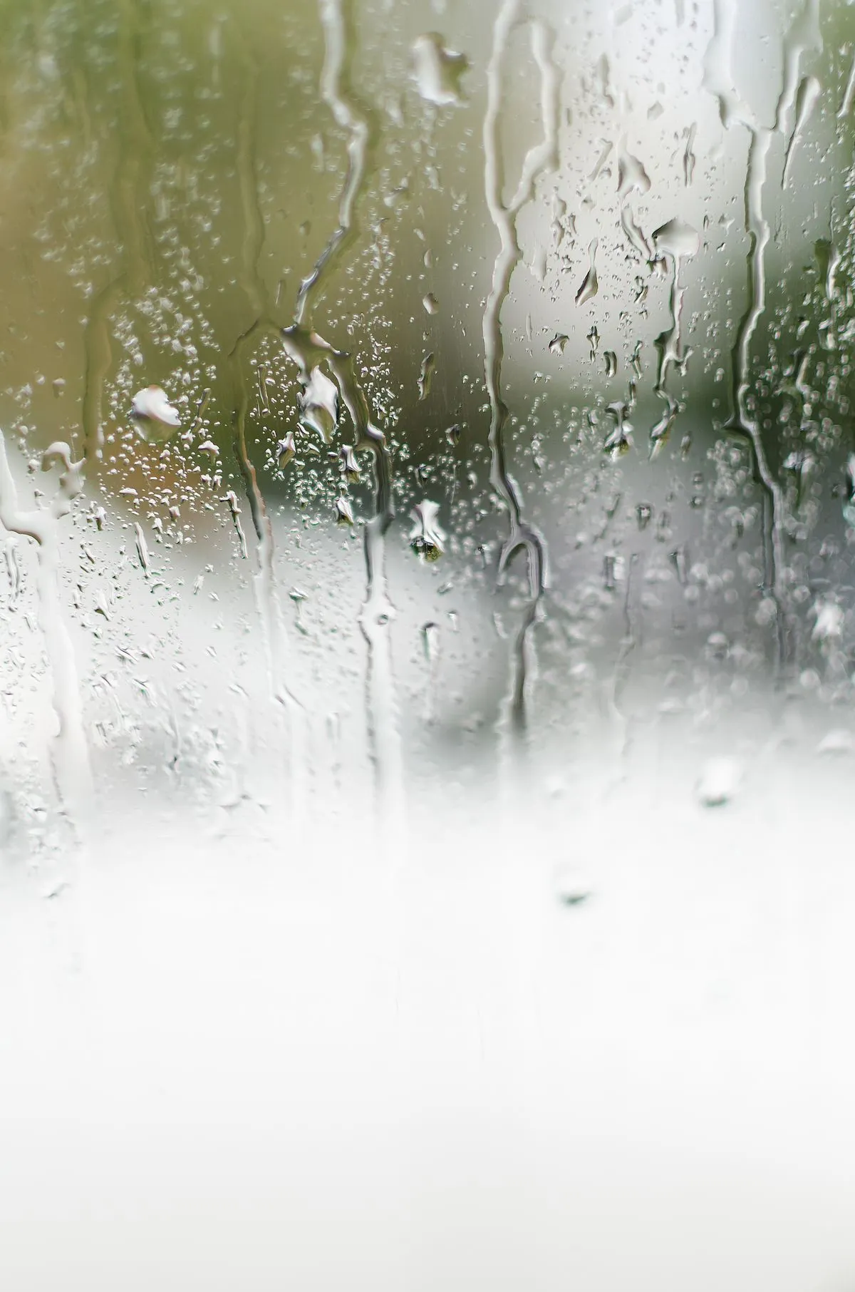 Water droplets on a window during a gentle rain